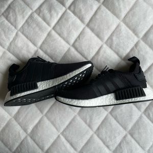 Black adidas NMDs